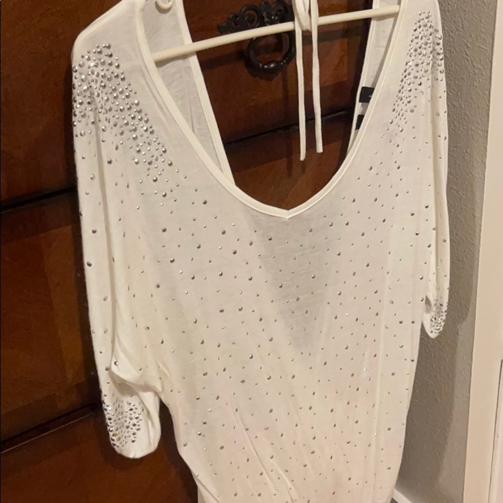 Open back, white dress shirt